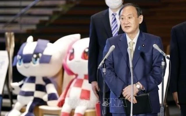 Thủ tướng Nhật Bản Suga Yoshihide phát biểu với báo giới tại Tokyo, Nhật Bản ngày 10-6-2021, trước khi lên đường tới Anh dự hội nghị thượng đỉnh G7. (Ảnh: Kyodo/ TTXVN)