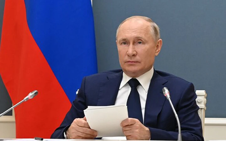 Tổng thống Nga V. Putin ký phê duyệt Chiến lược An ninh quốc gia mới và văn bản có hiệu lực từ ngày 2/7. (Ảnh: TASS)