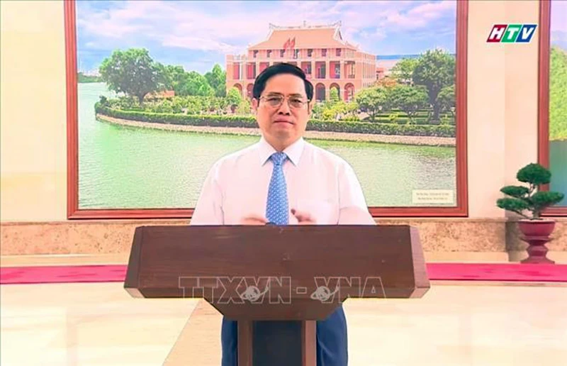 Thủ tướng Chính phủ Phạm Minh Chính phát biểu tại chương trình trực tuyến. (Ảnh chụp qua màn hình: Thu Hương/TTXVN)