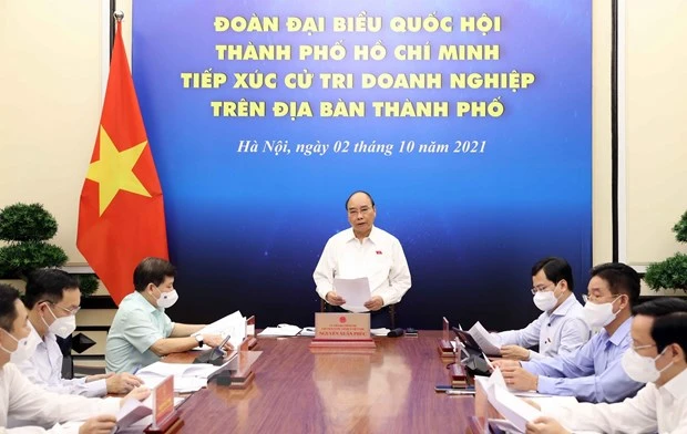 Chủ tịch nước Nguyễn Xuân Phúc phát biểu tại điểm cầu Hà Nội. (Ảnh: Thống Nhất/TTXVN)