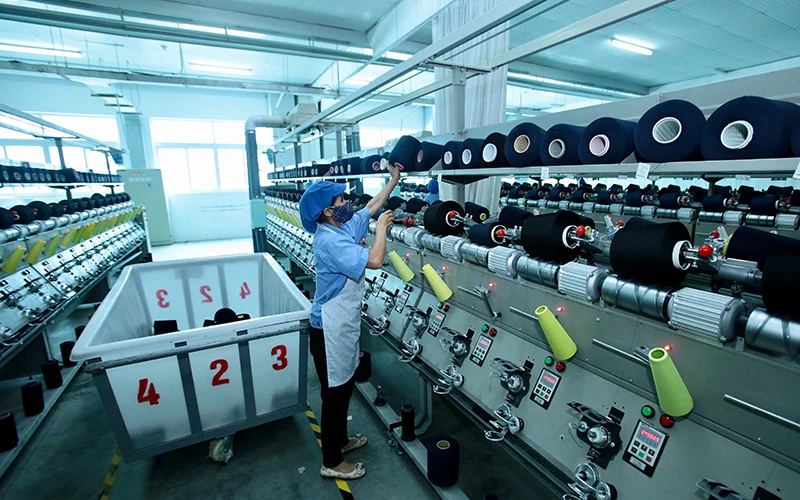 Dây chuyền sản xuất có vốn đầu tư Trung Quốc tại Công ty TNHH dệt nhuộm Jasan Việt Nam tại Khu công nghiệp Phố Nối B (Hưng Yên). Ảnh: VIẾT CHUNG