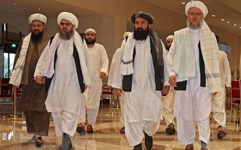 Phái đoàn quan chức Taliban tham gia một đàm phán. (Ảnh: AFP/TTXVN)