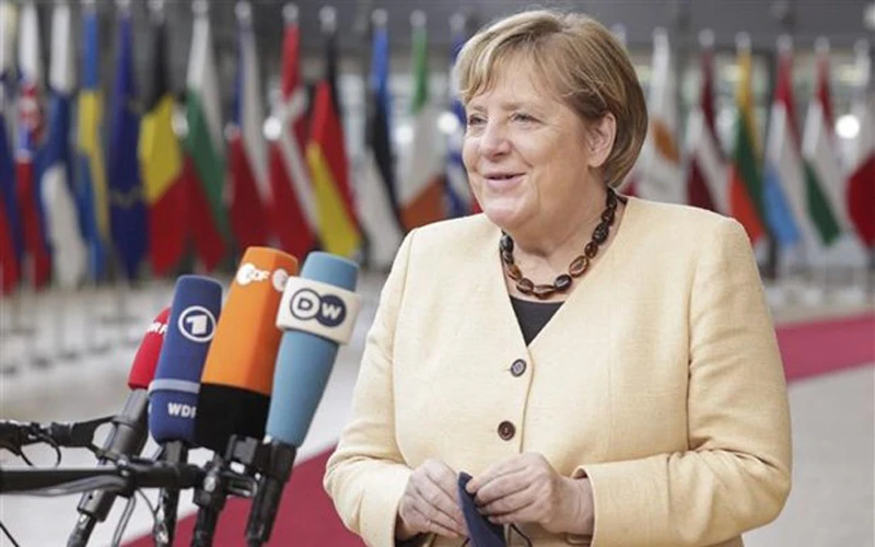 Thủ tướng Đức Angela Merkel phát biểu với báo giới khi tới tham dự hội nghị thượng đỉnh Liên minh châu Âu tại Brussels (Bỉ), ngày 21/10/2021. (Ảnh: AFP/TTXVN)