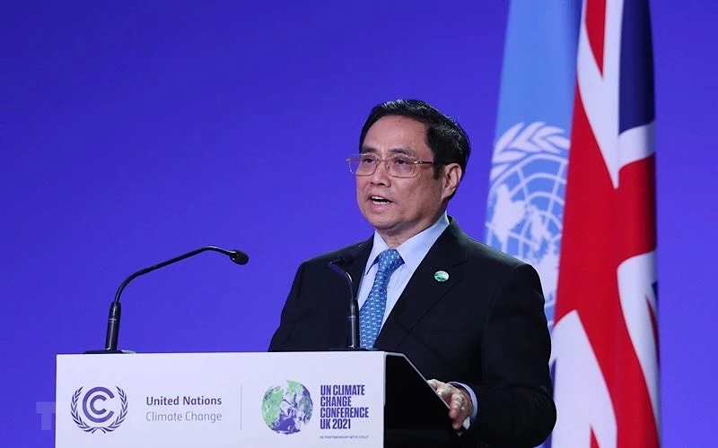 Thủ tướng Phạm Minh Chính phát biểu tại Hội nghị lần thứ 26 các Bên tham gia Công ước khung của Liên hợp quốc về Biến đổi khí hậu (COP26). (Ảnh: Dương Giang/TTXVN)