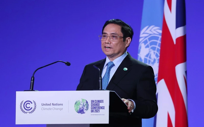Thủ tướng Phạm Minh Chính phát biểu tại Hội nghị thượng đỉnh khí hậu được tổ chức trong khuôn khổ Hội nghị lần thứ 26 các Bên tham gia Công ước khung của Liên hợp quốc về Biến đổi khí hậu (COP26), Glasgow, Scotland, Vương quốc Anh. (Ảnh: TTXVN) 