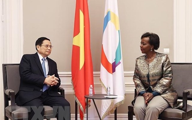Thủ tướng Phạm Minh Chính gặp bà Louise Mushikiwabo, Tổng Thư ký Tổ chức quốc tế Pháp ngữ (OIF). (Ảnh: TTXVN)