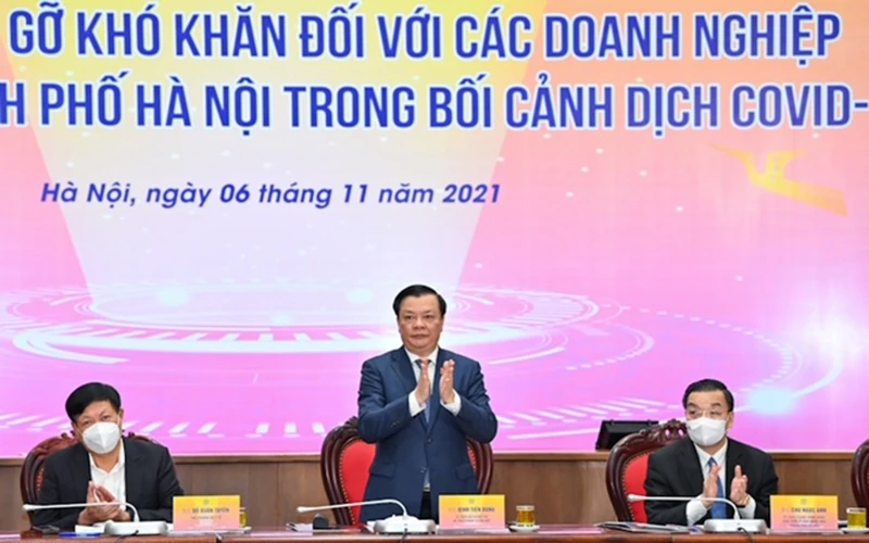 Hà Nội tổ chức Hội nghị “Đối thoại, tháo gỡ khó khăn đối với các doanh nghiệp trên địa bàn thành phố Hà Nội trong bối cảnh dịch Covid-19”. (Ảnh: DUY LINH)