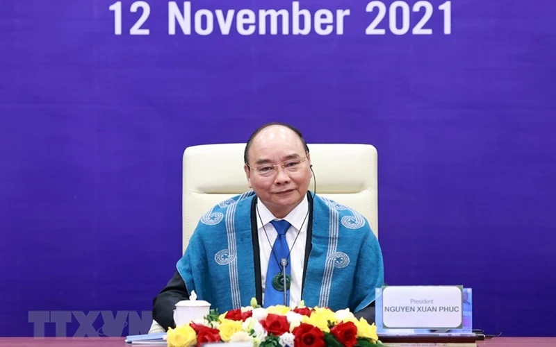 Chủ tịch nước Nguyễn Xuân Phúc dự Hội nghị các nhà Lãnh đạo kinh tế APEC lần thứ 28 theo hình thức trực tuyến. (Nguồn: TTXVN)