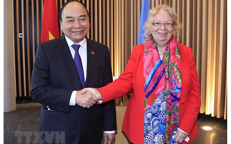 Chủ tịch nước Nguyễn Xuân Phúc gặp bà Tatiana Valoya, Tổng Giám đốc Văn phòng Liên hợp quốc tại Geneva. (Ảnh: Thống Nhất/TTXVN)