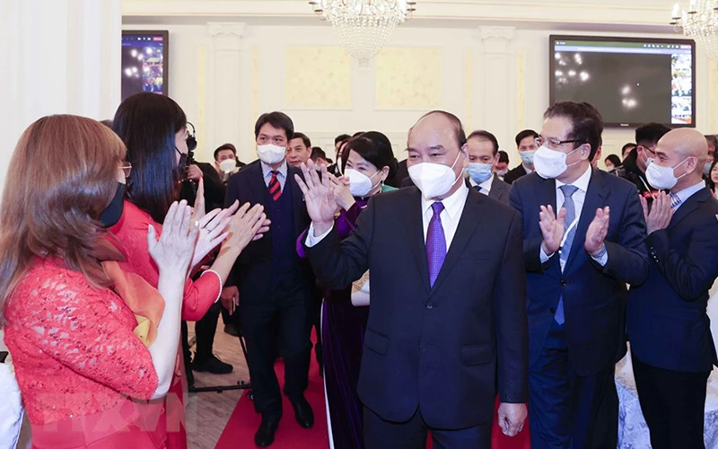 Hình ảnh Chủ tịch nước Nguyễn Xuân Phúc gặp gỡ đại diện cộng đồng Việt Nam tại Nga
