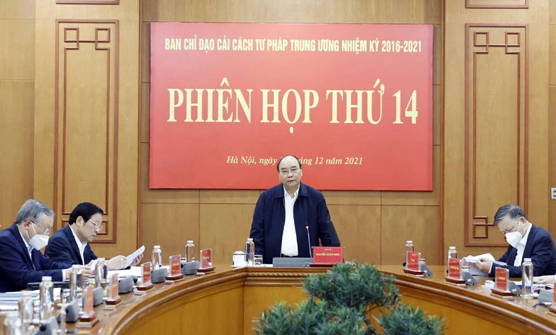 Chủ tịch nước Nguyễn Xuân Phúc phát biểu ý kiến tại phiên họp. (Ảnh: TXVN)