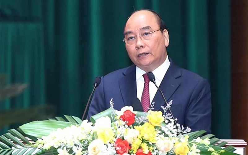 Chủ tịch nước Nguyễn Xuân Phúc phát biểu chỉ đạo tại hội nghị. (Ảnh: TTXVN)