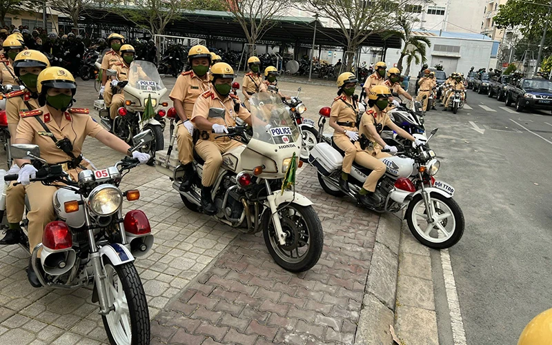 Công an thành phố Hồ Chí Minh ra quân bảo đảm an ninh trật tự dịp Tết Nguyên đán. Ảnh: QUANG QUÝ