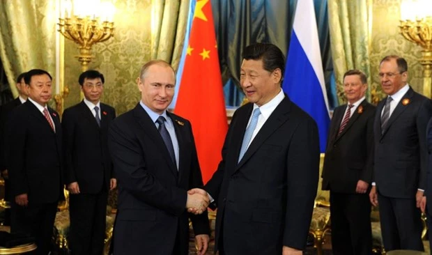 Tổng thống Nga Vladimir Putin và Chủ tịch Trung Quốc Tập Cận Bình. (Nguồn: TASS/TTXVN)