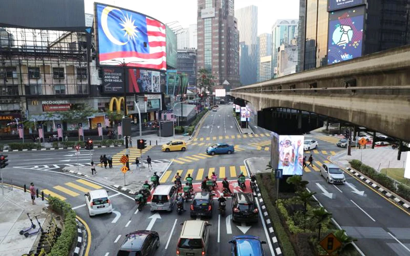 Từ 1/4, Malaysia mở cửa đón khách quốc tế mà không cần cách ly. (Ảnh: REUTERS)