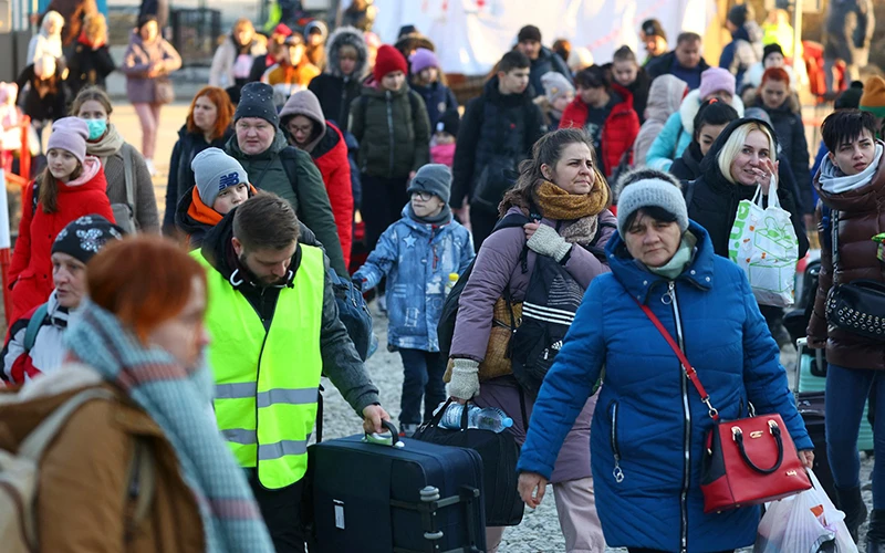 Người tị nạn Ukraine tại một trạm kiểm soát biên giới ở Ba Lan. (Ảnh Reuters) 