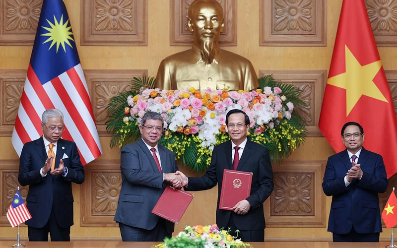 Lễ Trao đổi “Bản ghi nhớ về tuyển dụng, việc làm và hồi hương lao động giữa Chính phủ nước CHXNCN Việt Nam và Chính phủ Malaysia”.
