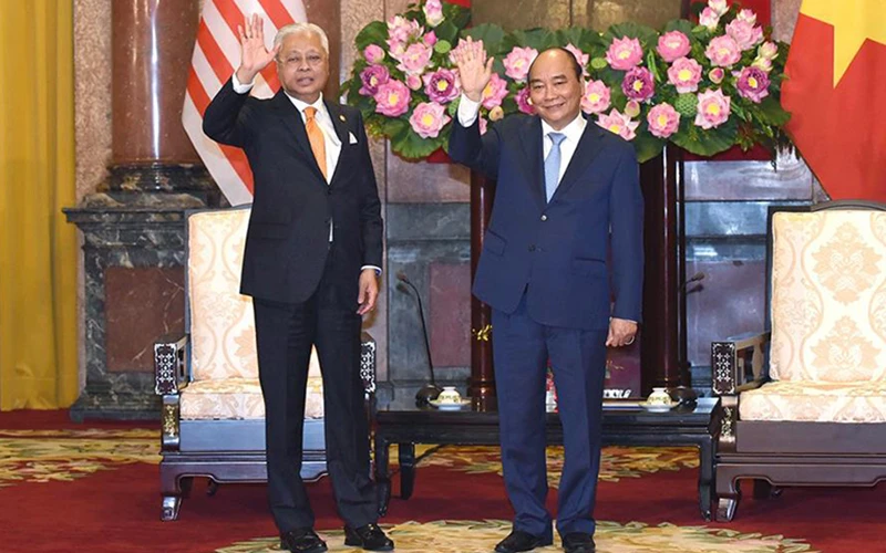 Chủ tịch nước Nguyễn Xuân Phúc tiếp Thủ tướng Malaysia Ismail Sabri Yaakob thăm chính thức Việt Nam. (Ảnh: TRẦN HẢI)