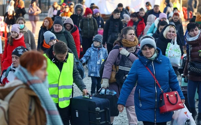 Người tị nạn Ukraine tại 1 trạm kiểm soát biên giới ở Kroscienko, Ba Lan, ngày 17/3/2022. (Ảnh: REUTERS)