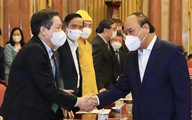 Chủ tịch nước Nguyễn Xuân Phúc với các đại biểu dự hôi nghị. (Ảnh: Thống Nhất/TTXVN)