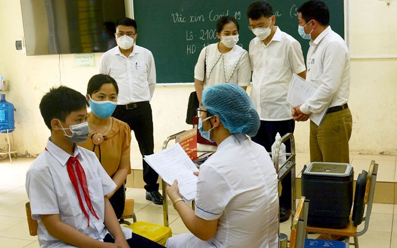 Tiêm vaccine phòng Covid-19 cho trẻ từ 5 tuổi đến dưới 12 tuổi tại Hà Nội. Ảnh: NGUYÊN TRANG
