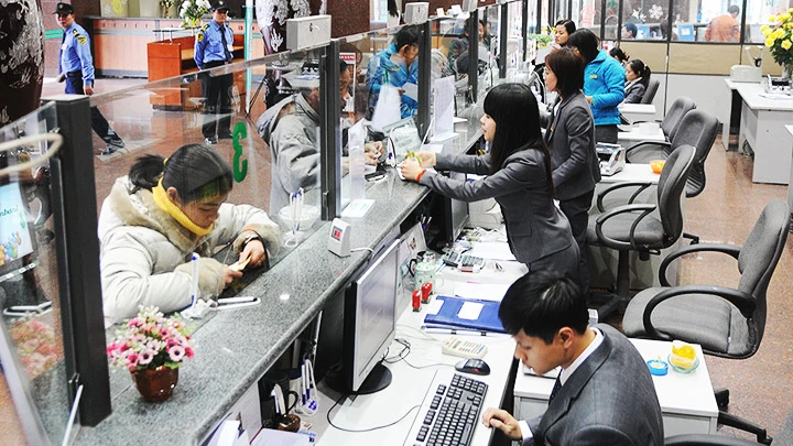 Ngân hàng TMCP Ngoại thương Việt Nam (Vietcombank) đứng tốp 3 vốn hóa của các doanh nghiệp lớn niêm yết trên HSX. Ảnh: NAM ANH