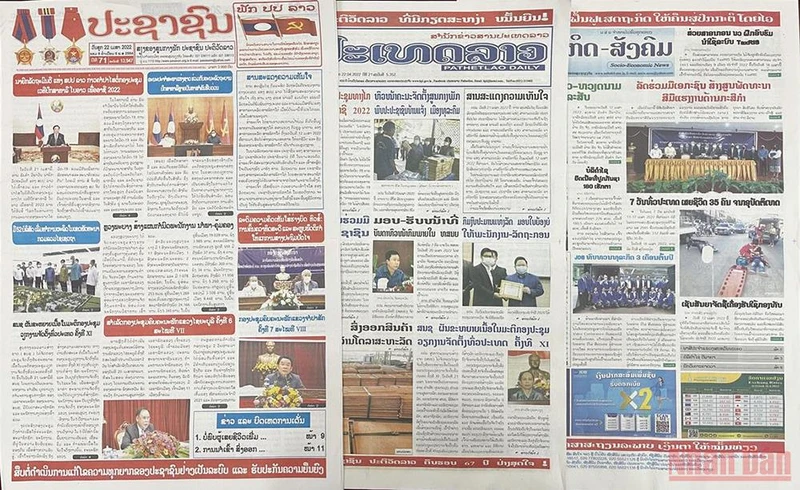 Một số báo lớn của Lào mấy ngày qua đăng nhiều tin, bài về Việt Nam và quan hệ Lào-Việt Nam. Ảnh: Duy Toàn.