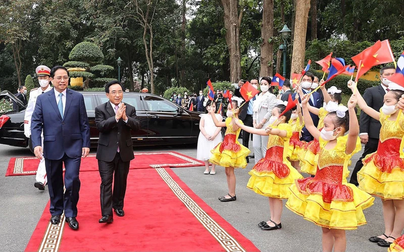 Thủ tướng Phạm Minh Chính đón Thủ tướng Lào Phankham Viphavanh thăm chính thức Việt Nam, tháng 1/2022. (Ảnh: TRẦN HẢI)