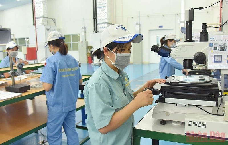 Ảnh minh họa: Công nhân lao động sản xuất tại Khu công nghiệp VSIP Bắc Ninh, tỉnh Bắc Ninh. (Ảnh: NGUYỄN ĐĂNG)