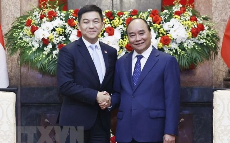 Chủ tịch nước Nguyễn Xuân Phúc tiếp Chủ tịch Quốc hội Cộng hòa Singapore Tan Chuan-Jin. (Ảnh: Thống Nhất/TTXVN)