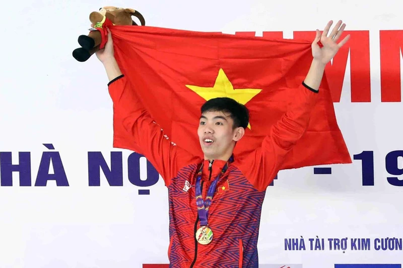 Nguyễn Huy Hoàng giành cú đúp Huy chương Vàng ở nội dung bơi tự do và bơi bướm. (Ảnh: TTXVN)