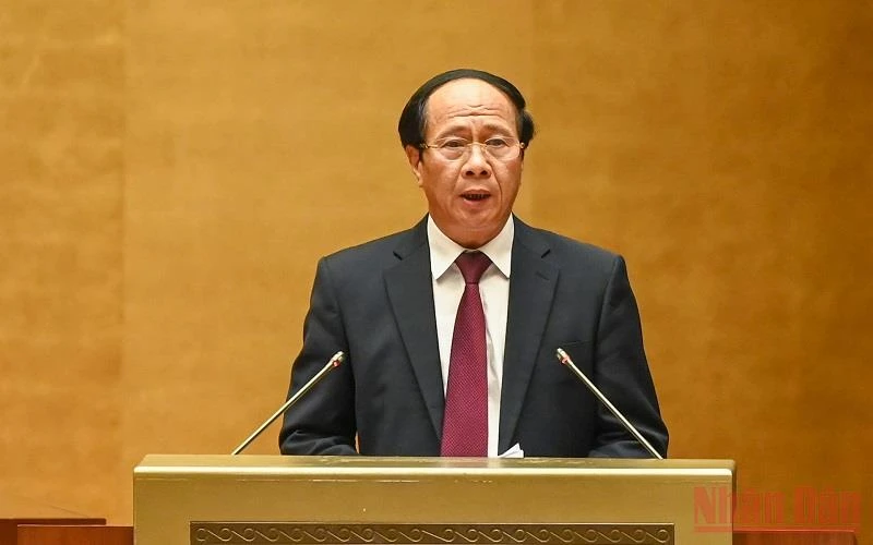 Phó Thủ tướng Lê Văn Thành trình bày Báo cáo của Chính phủ tại phiên khai mạc Kỳ họp thứ 3, Quốc hội khóa XV. (Ảnh: DUY LINH)