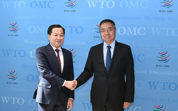 Phó Thủ tướng Chính phủ Lê Minh Khái và Phó Tổng Giám đốc WTO Trương Hướng Thần. (Ảnh: VGP)