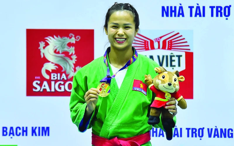 Tô Thị Trang "mở hàng" huy chương vàng cho Thể thao Việt Nam. Ảnh: Mỹ Hà