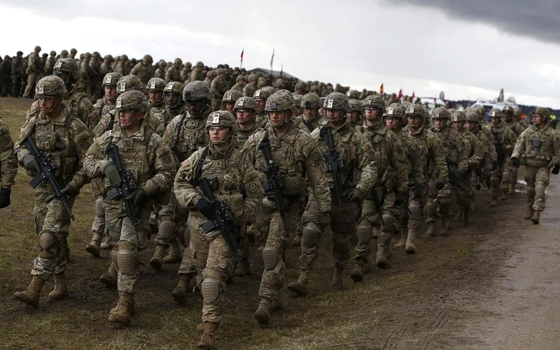 Các binh sĩ Mỹ tại lễ chào đón quân đội NATO tại Orzysz, Ba Lan. (Ảnh: REUTERS)
