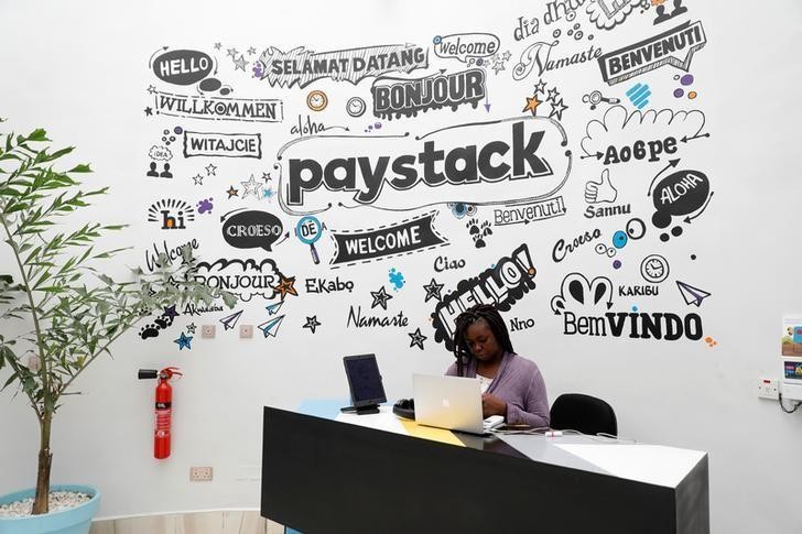 Nhân viên làm việc tại quầy lễ tân của Công ty thanh toán trực tuyến Paystack ở thành phố Ikeja, bang Lagos, Nigeria. (Ảnh minh họa: Reuters)