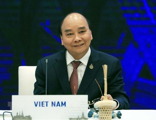 Chủ tịch nước Nguyễn Xuân Phúc khẳng định Việt Nam ủng hộ hệ thống thương mại đa phương dựa trên nguyên tắc và luật lệ, với WTO là trung tâm. (Ảnh: TTXVN) 