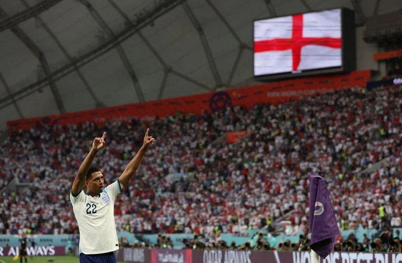 Tài năng trẻ Jude Bellingham ăn mừng sau khi mở tỷ số cho tuyển Anh trong trận ra quân bảng B gặp Iran tối 21/11. (Ảnh: Reuters)