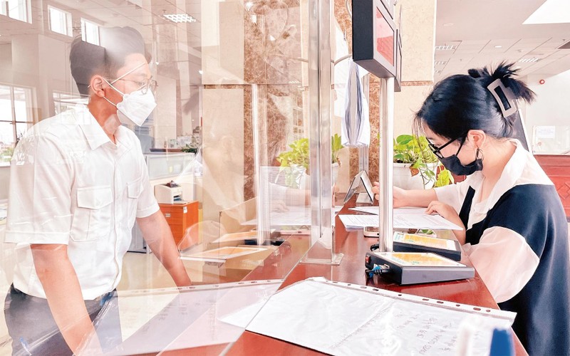 Người nộp thuế thực hiện các thủ tục tại trụ sở Cục Thuế Thành phố Hồ Chí Minh. 