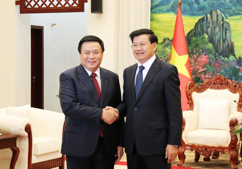 Đồng chí Nguyễn Xuân Thắng tiếp kiến Tổng Bí thư, Chủ tịch nước Lào Thongloun Sisoulith. (Ảnh: TRỊNH DŨNG)