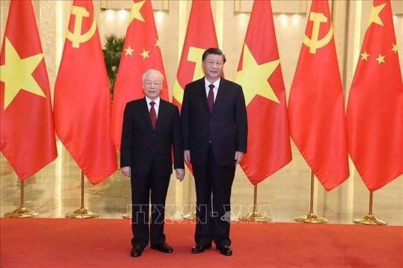 Tổng Bí thư Nguyễn Phú Trọng và Tổng Bí thư, Chủ tịch Trung Quốc Tập Cận Bình chụp ảnh chung. (Ảnh: TTXVN)