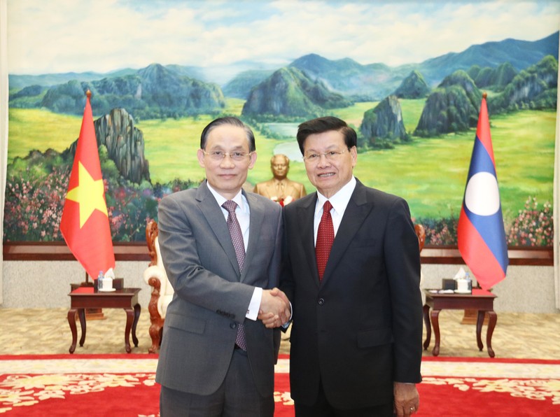 Tổng Bí thư, Chủ tịch nước và các nhà lãnh đạo cấp cao Lào tiếp đoàn đại  biểu Ban Đối ngoại Trung ương Đảng ta