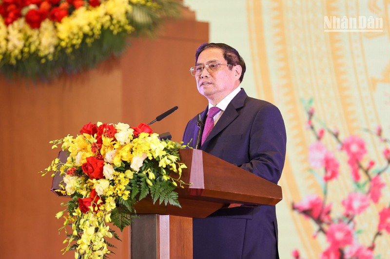 Thủ tướng Phạm Minh Chính phát biểu tại tiệc chiêu đãi Đoàn Ngoại giao tối 9/1. (Ảnh: TRẦN HẢI)