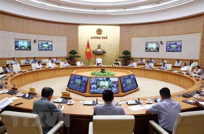 Phó Thủ tướng Trần Lưu Quang chủ trì họp Ban Chỉ đạo quốc gia về chống khai thác hải sản bất hợp pháp. (Ảnh: TTXVN)