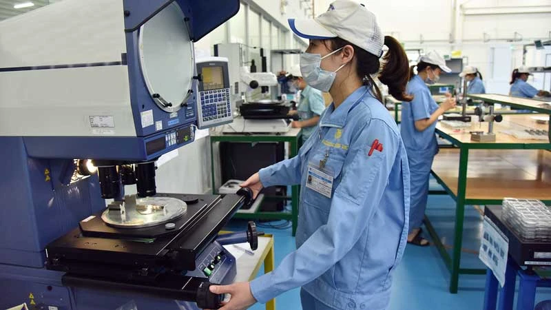 Hoạt động sản xuất tại một doanh nghiệp có vốn đầu tư nước ngoài ở Khu công nghiệp VSIP Bắc Ninh. (Ảnh ĐĂNG KHOA)