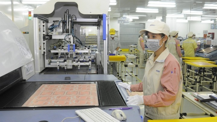 Sản xuất bảng mạch điện tử tại Công ty Meiko thuộc Khu công nghiệp Thạch Thất (Quốc Oai, Hà Nội). (Ảnh: Nguyễn Trang)