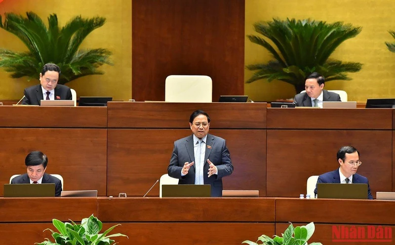 Thủ tướng Chính phủ Phạm Minh Chính trả lời chất vấn của các đại biểu Quốc hội trong phiên họp chiều 5/11. Ảnh: THỦY NGUYÊN