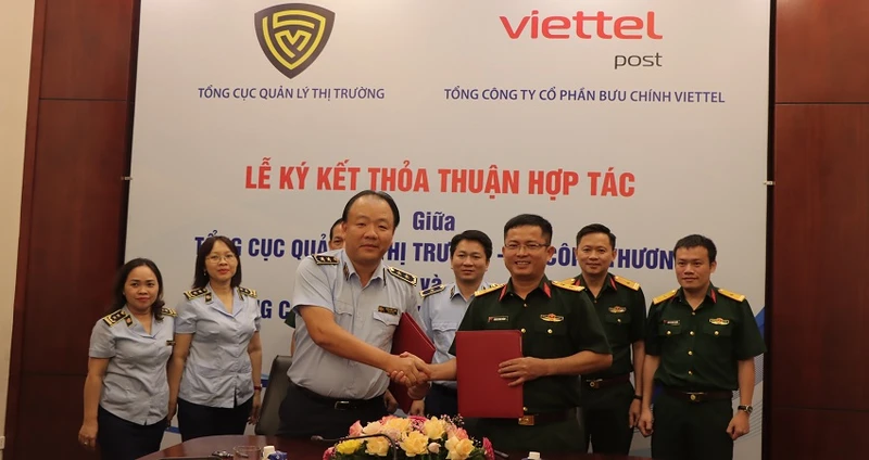 Lễ ký kết thỏa thuận hợp tác giữa Tổng cục Quản lý thị trường với Viettel Post.