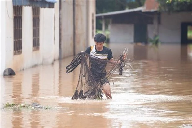 Mưa lớn gây ngập lụt tại Vientiane, Lào ngày 7/8. (Ảnh: THX/TTXVN)