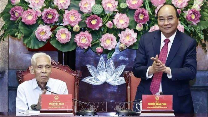 Chủ tịch nước Nguyễn Xuân Phúc tại buổi gặp mặt. (Ảnh: TTXVN)